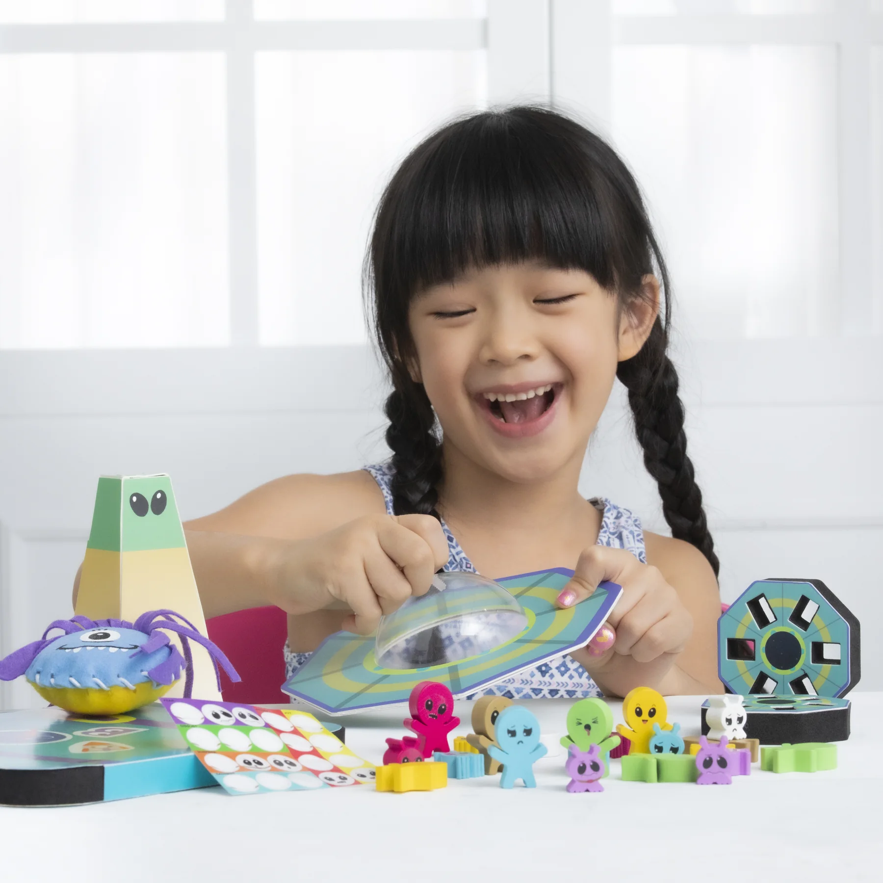 A child laughing while playing the finished iCalm Galaxy balancing game