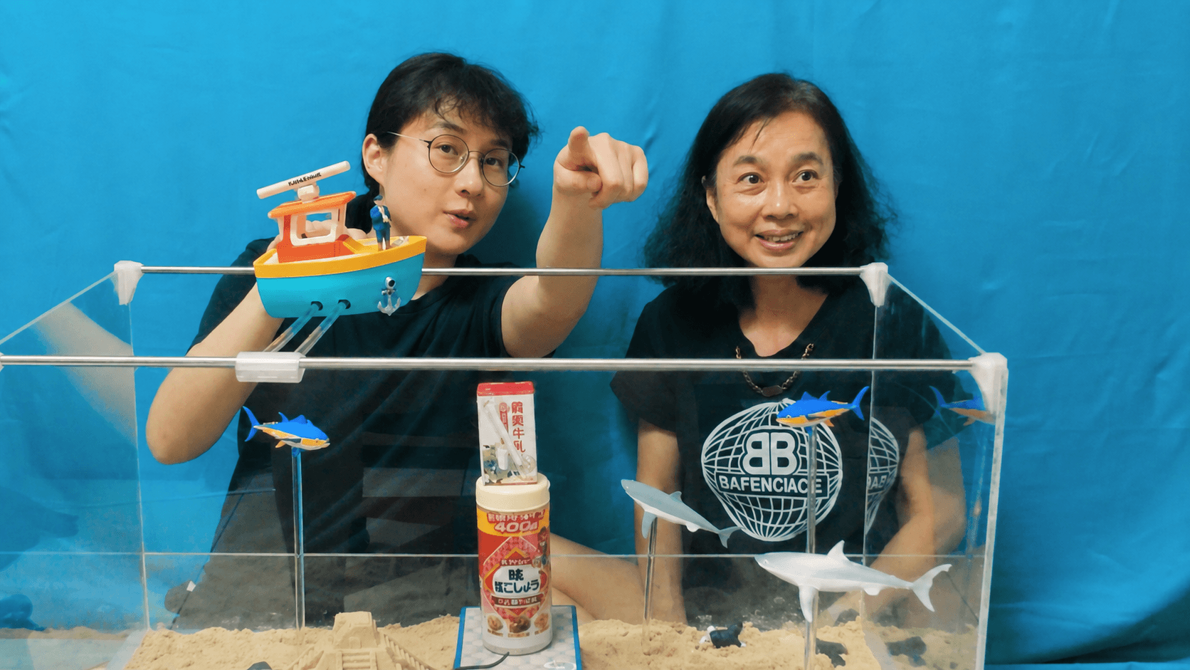 Players piloting EchoScout across their physical underwater world